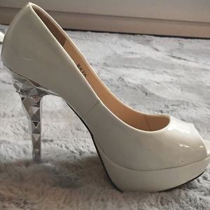 White pumps with Mirrored silver heel